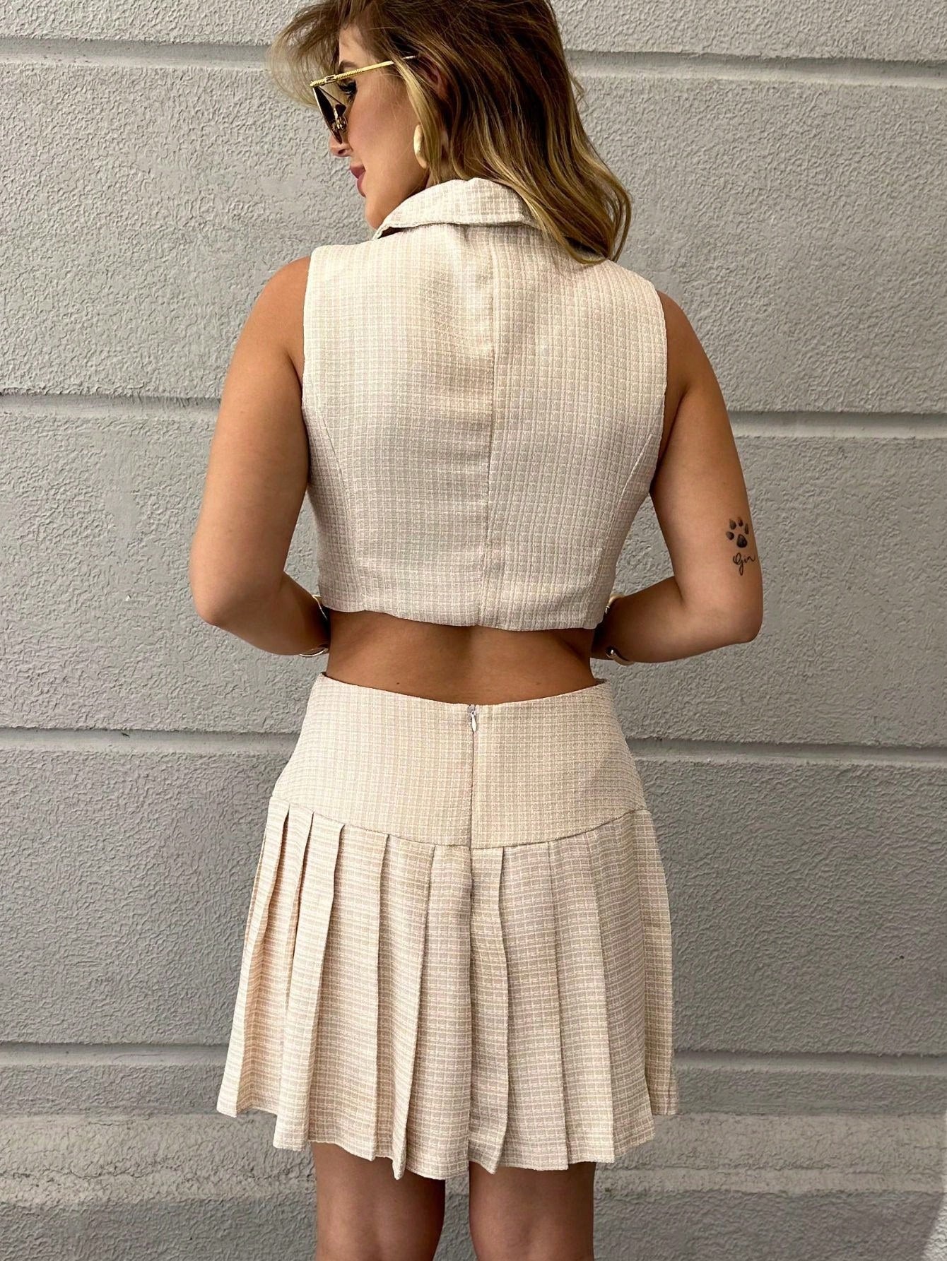 Vendedor IndicadoSHEIN EMILI CONJUNTO COLEGE CROPPED E SAIA COLEGIAL PREGAS